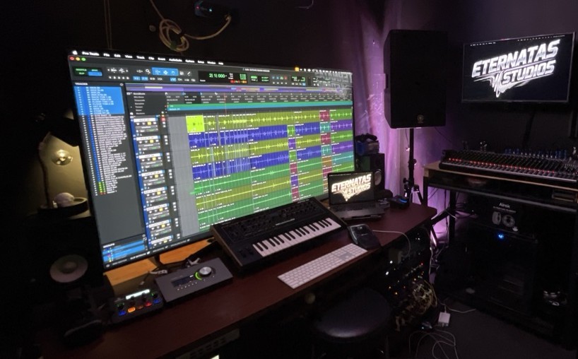 The Eternatas Studios workstation — Pro Tools on the big screen, Jupiter-Xm, Apollo control, mixer and racks